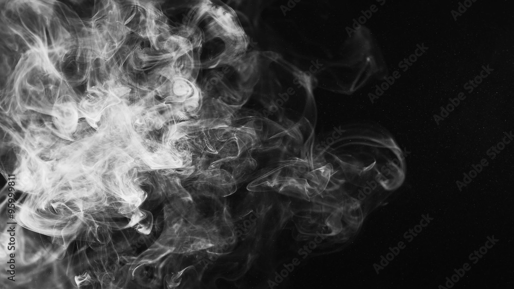 Wispy smoke filling screen amid atmospheric dust particles Wispy smoke filling screen amid atmospheric dust particles