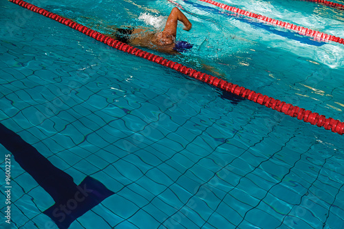 Athletic swimmer in action 1