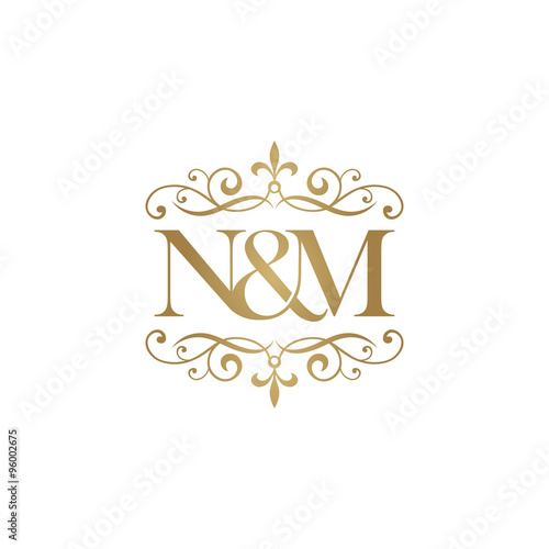 N&M Initial logo. Ornament ampersand monogram golden logo photo