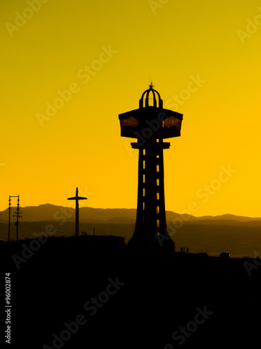 Tower silhouette at sunset time photo