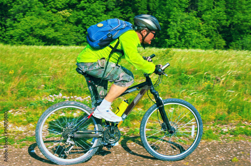 Cyclist riding a bike in the park