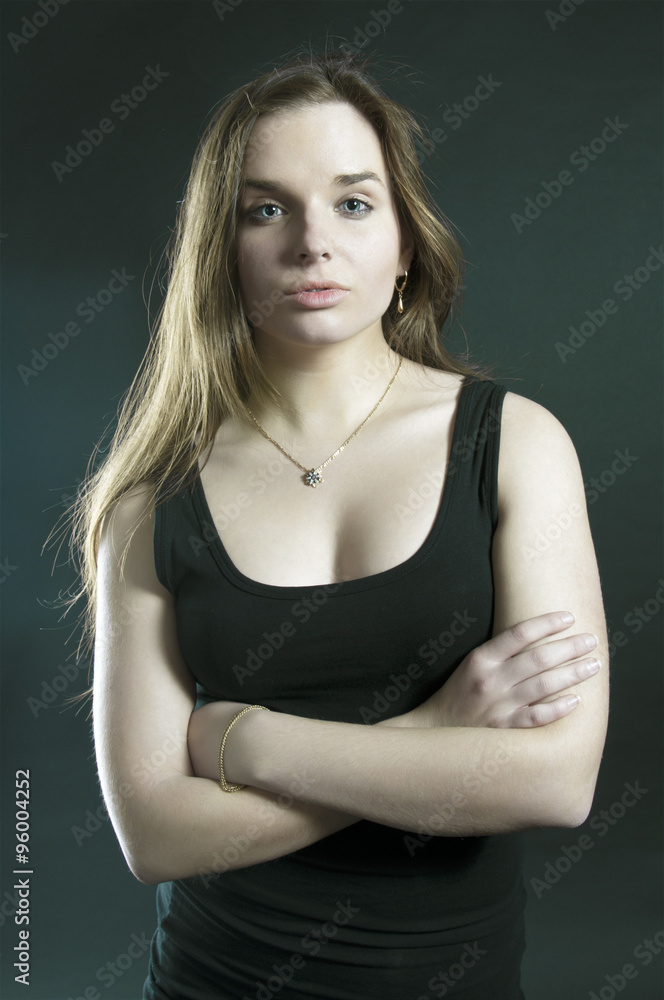 Young beautiful girl on dark background Young beautiful girl on dark background
