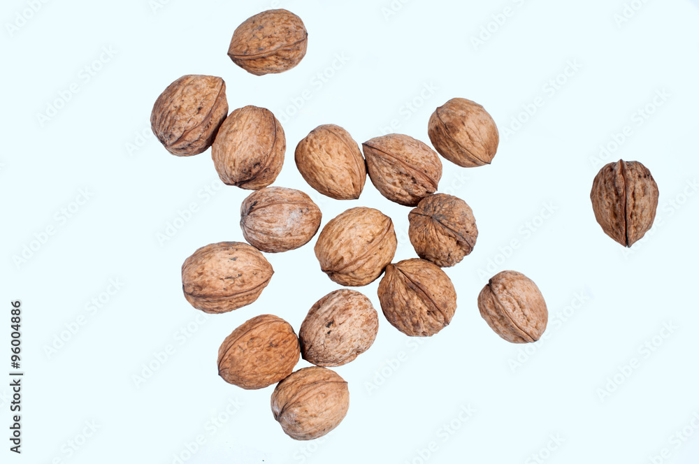 Composition from nuts on the white isolated background. Composition from nuts on the white isolated background.