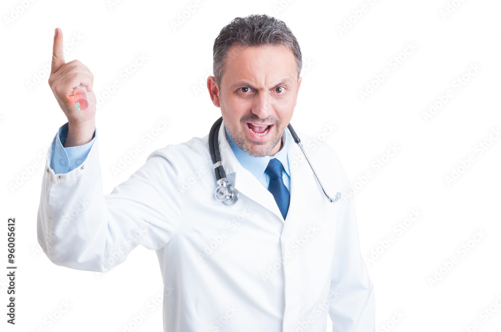 Angry aggressive doctor or medic threatening with syringe Angry aggressive doctor or medic threatening with syringe
