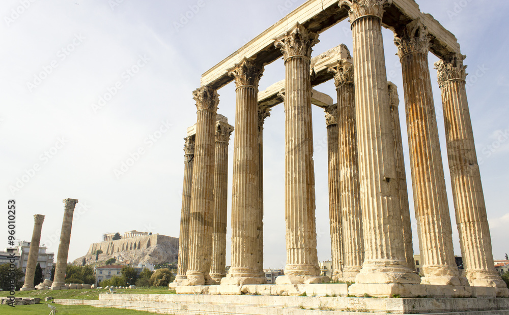 Temple of Olympian Zeus in day time with acropolis in background