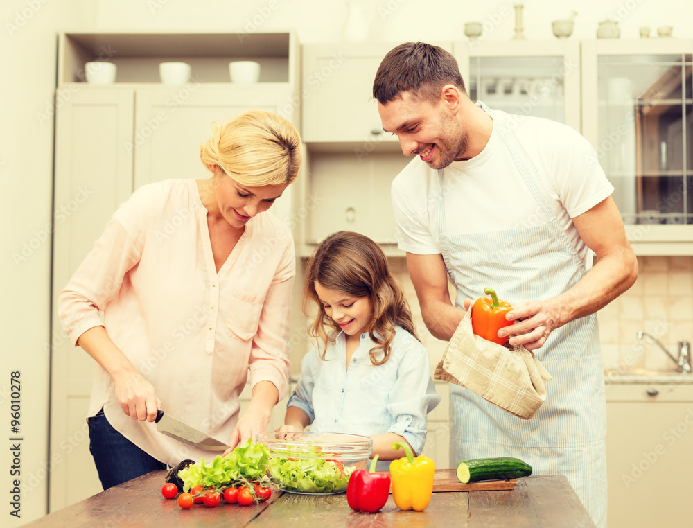 happy family making dinner in kitchen happy family making dinner in kitchen