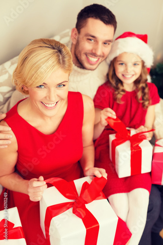 happy family opening gift boxes