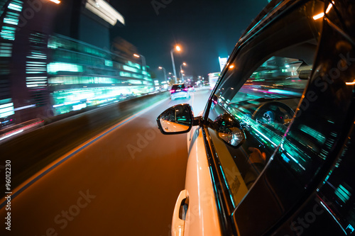 Car driving at night city