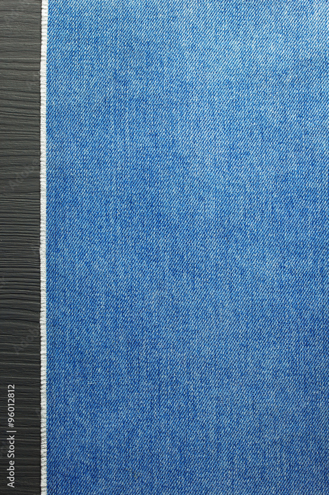 Fototapeta premium blue jeans texture on wood