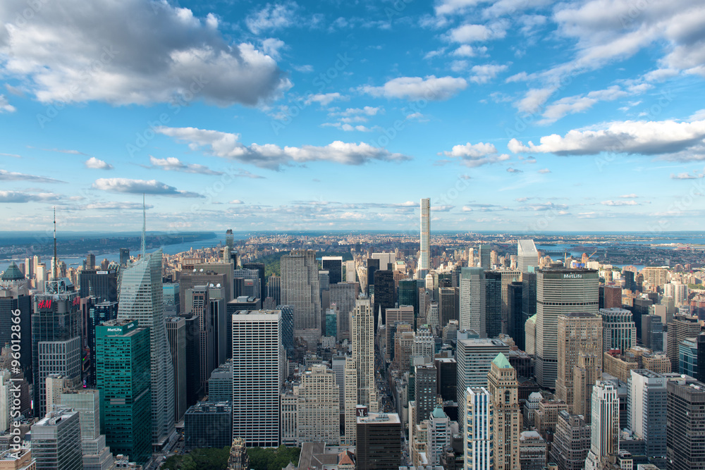 Overview of New York City with Blue Sky and Clouds