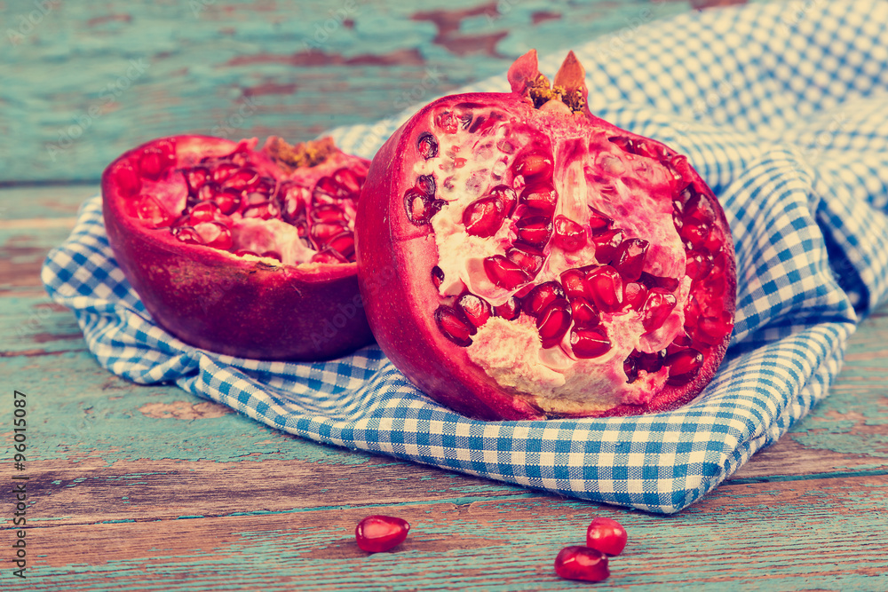 Fresh pomegranate on wooden boards. Fresh pomegranate on wooden boards.