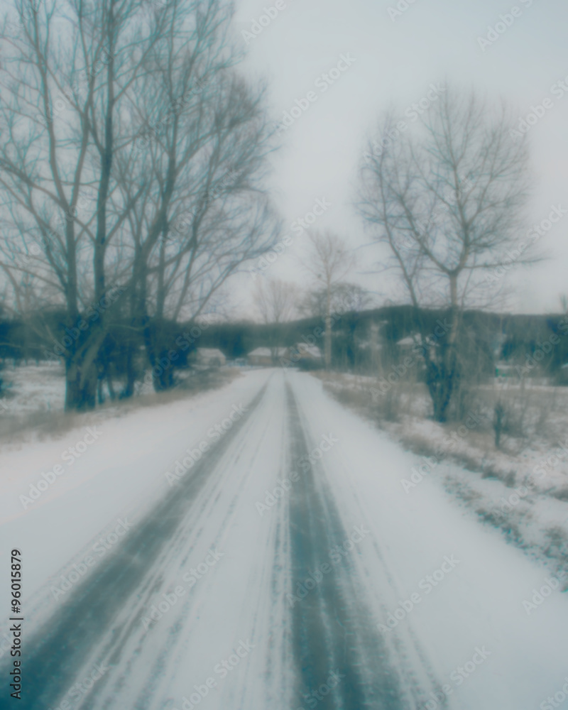Obraz premium winter landscape road in the village