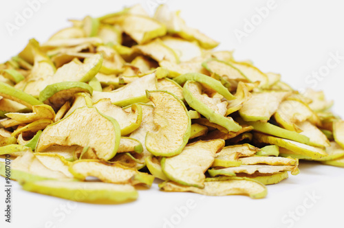 pile of dry slices of green apples closeup