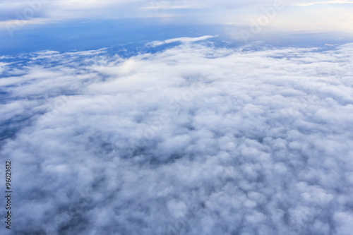 Blue sky and Cloud Top view from airplane window