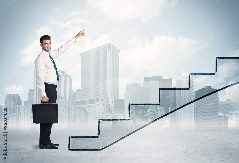 Business person in front of a staircase Business person in front of a staircase