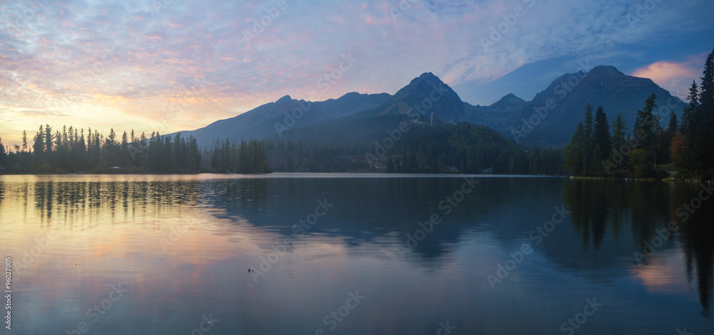 sunset over a mountain lake Strbske Pleso