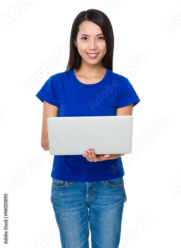 Asian Young Woman working with the notebook computer