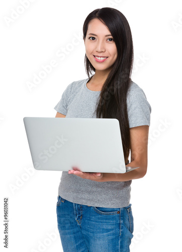 Young Woman use of the notebook computer © leungchopan