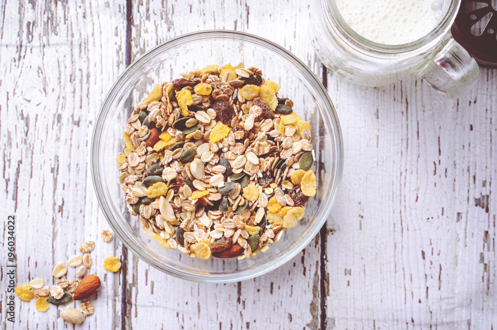 Delicious and healthy cereal in bowl with milk Delicious and healthy cereal in bowl with milk