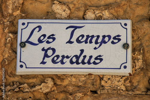 Street sign in Mdina,Malta, with the message:” Les temps perdus” . photo