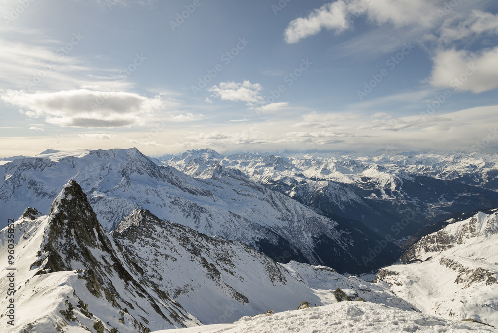 rocky ridges and mountain range winter landscape