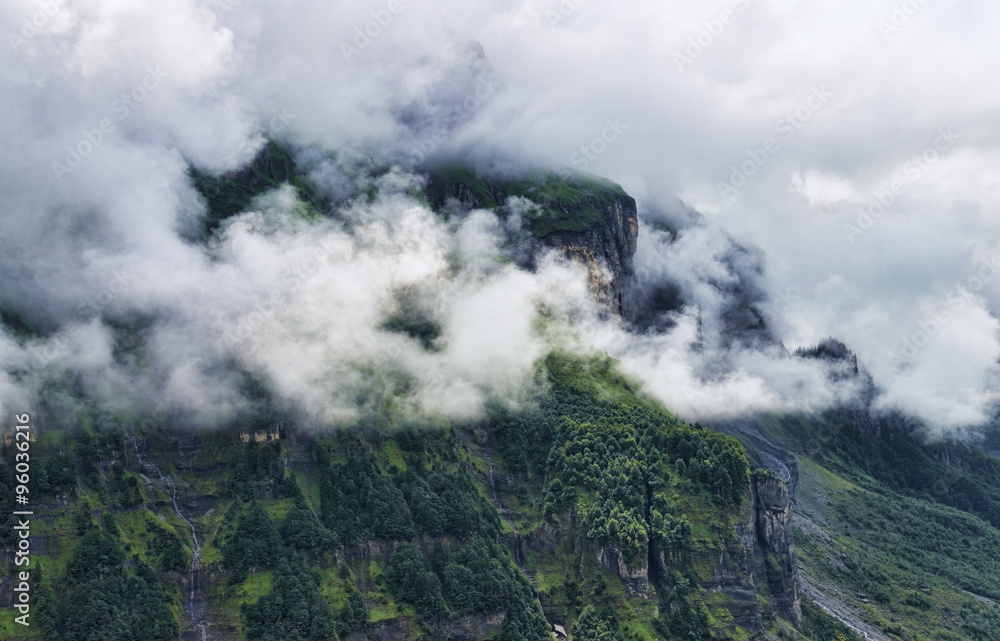 Cloudy alpine summer landscape