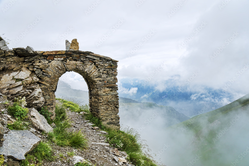 Scenic aerial view alpine landscape with arch building