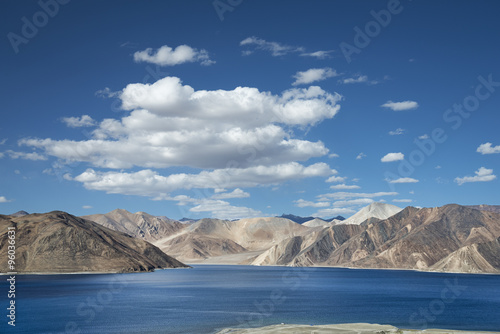 Dark blue water high mountain lake aerial view