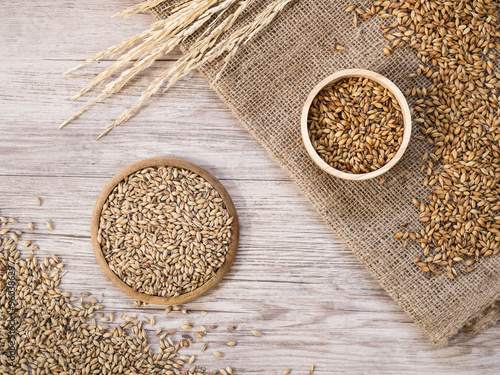 Top view - Beer ingredients, Pale ale and caramel malt on wooden background