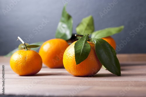 mandarins on wooden table