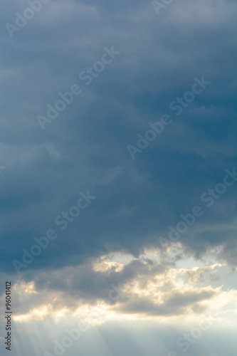 Overcast day sun beam through the clouds