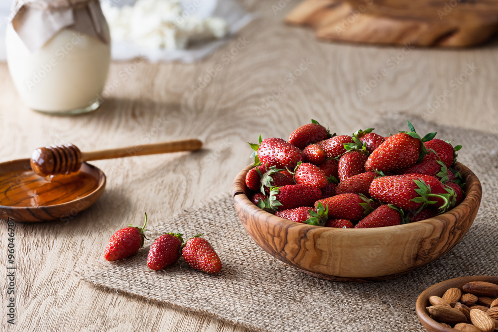 Wooden bowl with fresh stawberries Wooden bowl with fresh stawberries