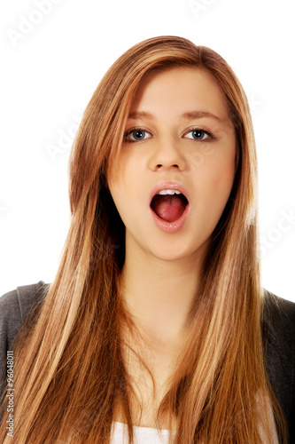 Portrait of teenage screaming woman 