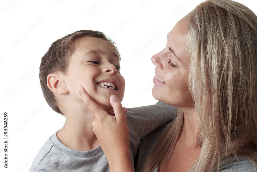mother looking at son's milk tooth mother looking at son's milk tooth