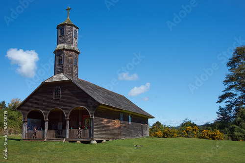 Historic wooden church, Iglesia de Colo, built in the 17th century by Jesuit missionaries on the island of Chiloe in Chile. photo