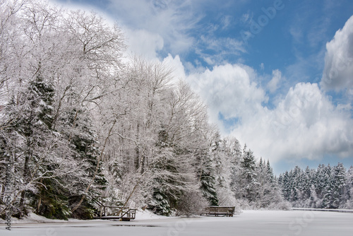 Frozen lake after a fresh snow, above a Knox Dam in Prince Edward Island