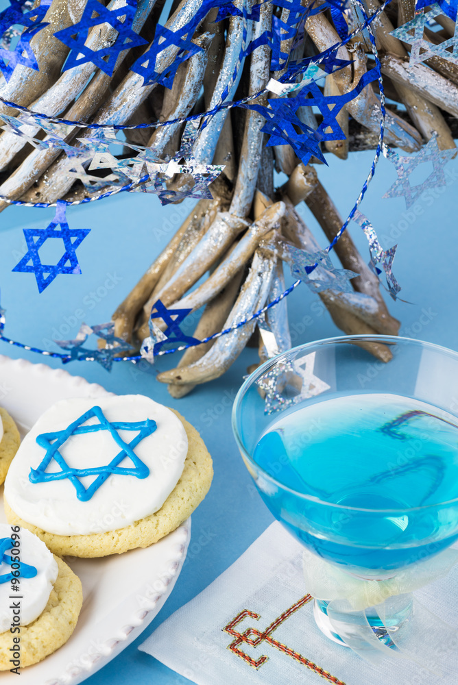 Hanukkah cookies and blue cocktail.