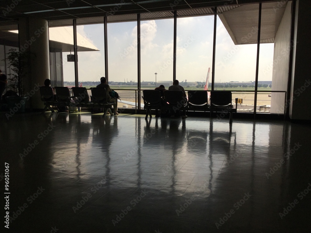 Silhouettes at the gate in airport