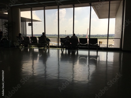 Silhouettes at the gate in airport
