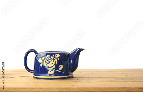 Stock Photo:.Tea Kettle on wood table