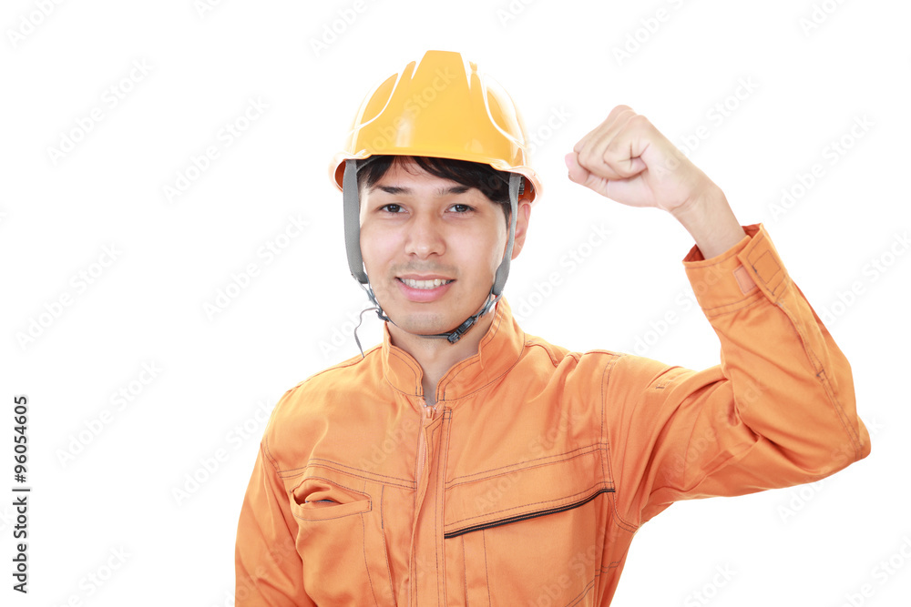 ガッツポーズの労働者