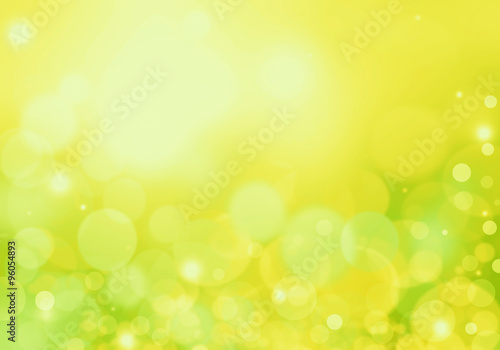 Green abstract background with circles of light