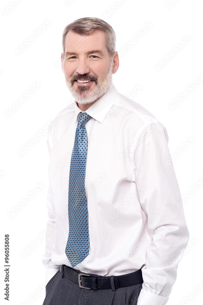 Smiling businessman with hands in pocket Smiling businessman with hands in pocket