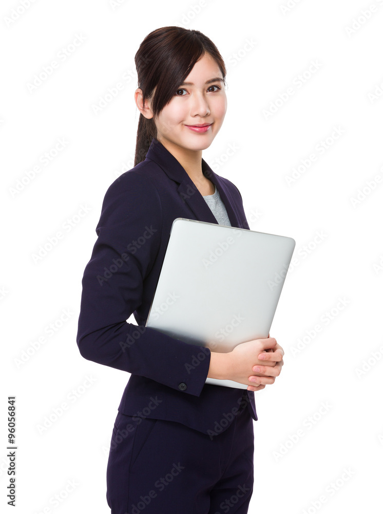 Asian Businesswoman hold with laptop computer Asian Businesswoman hold with laptop computer