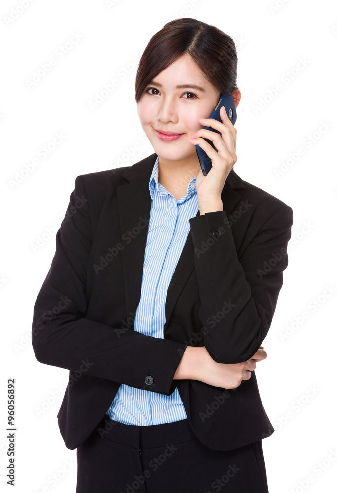 Asian Young Businesswoman talk to mobile phone Asian Young Businesswoman talk to mobile phone