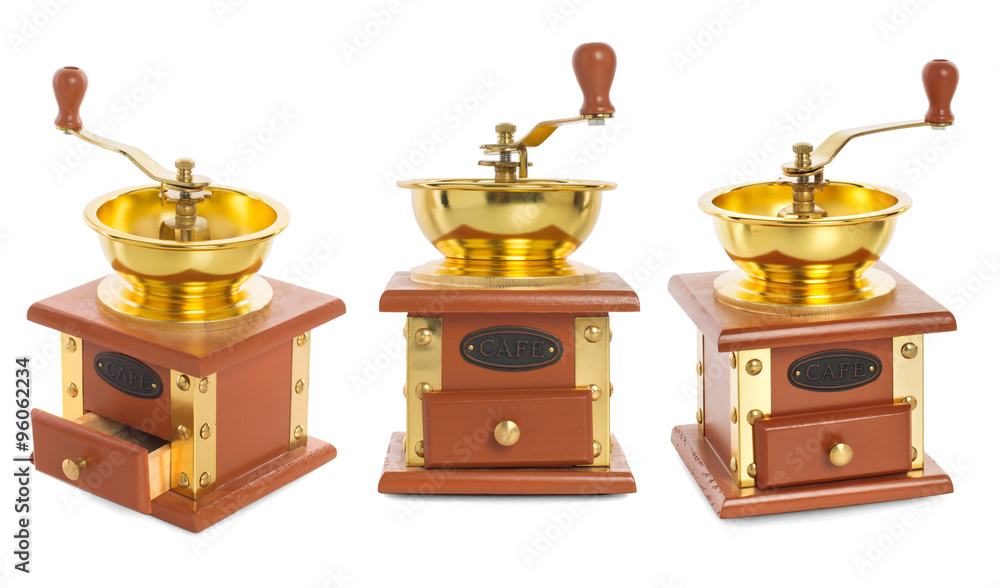 Set wooden coffee mill with gold-plated metal isolated on white Set wooden coffee mill with gold-plated metal isolated on white