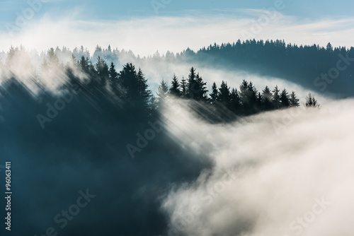 Foggy Landscape. A view from mountains to the valley covered with foggy landscape. © krstrbrt