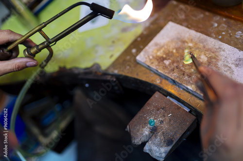 Goldsmith working on a ring