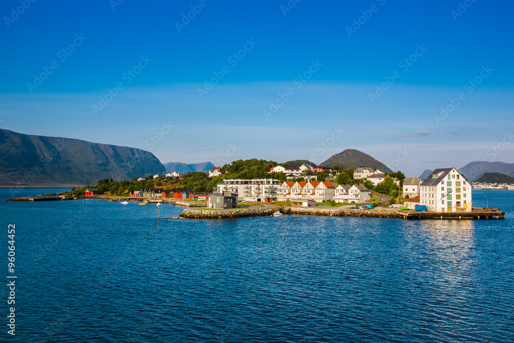 The coastline of the city of Alesund , Norway
