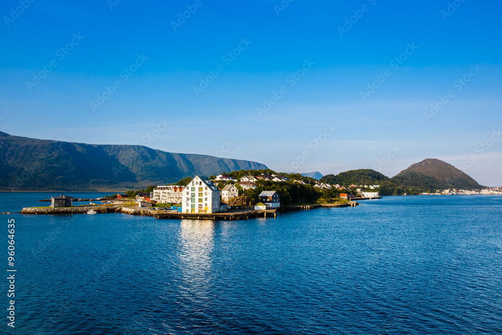 The coastline of the city of Alesund , Norway